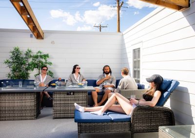 group of people relaxing at rooftop spa