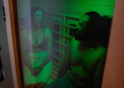 man and woman inside sauna room