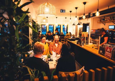 people smiling while having dinner