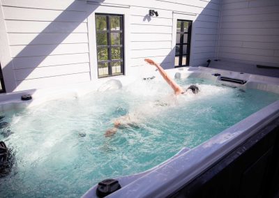 person swimming in a large jacuzzi