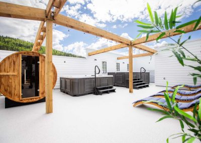 sauna, jacuzzi and lounge chairs