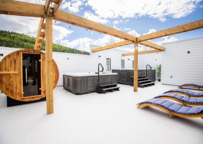 lounge chairs in front of sauna and jacuzzi