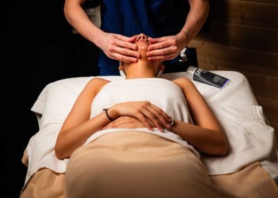 person having a face massaged