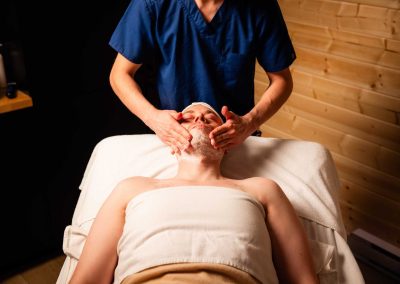 person having his face massaged