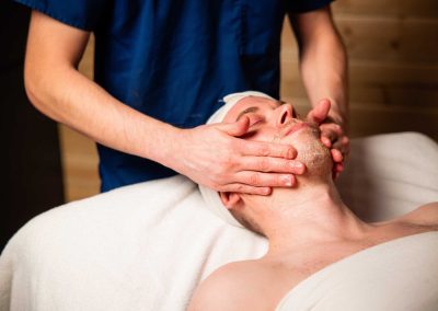 person having his face massaged