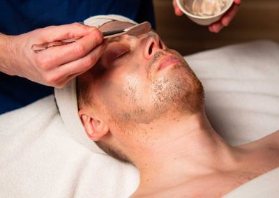cream being applied to a person's face