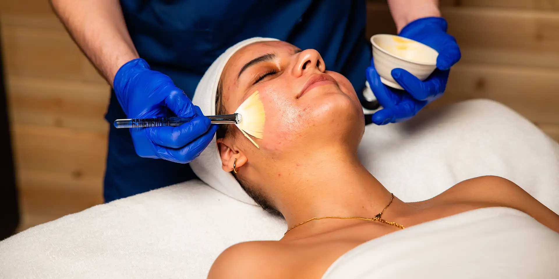 person having a face massaged